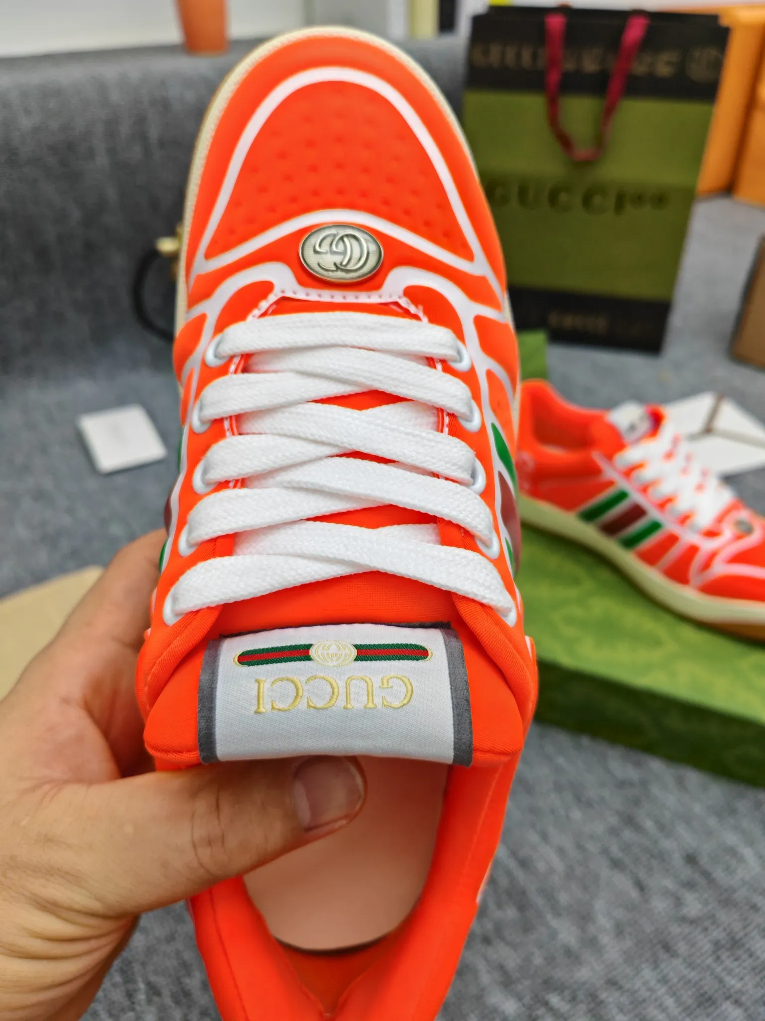 Factory price 600💰Screener series embellished web sneakers. This item is from the Gucci Lido series. Its design is inspired by the summer style and beach clubs of the Italian coast. The Screener series of sneakers draws inspiration from classic sneakers from the 1970s and takes its name from a special defensive move in sports. This shoe from the 2024 Pre-Fall collection is crafted from yellow rubber, a technical and malleable opaque material, with striped webbing on the sides and an embossed Gucci printed logo on the heel. Yellow rubber, opaque and technological in appearance. Red and green webbing decorated with metal Double G oval enamel details. Gucci printed embossed logo. Women 35-40, men 38-45, (men 38 and 45 need to be customized)